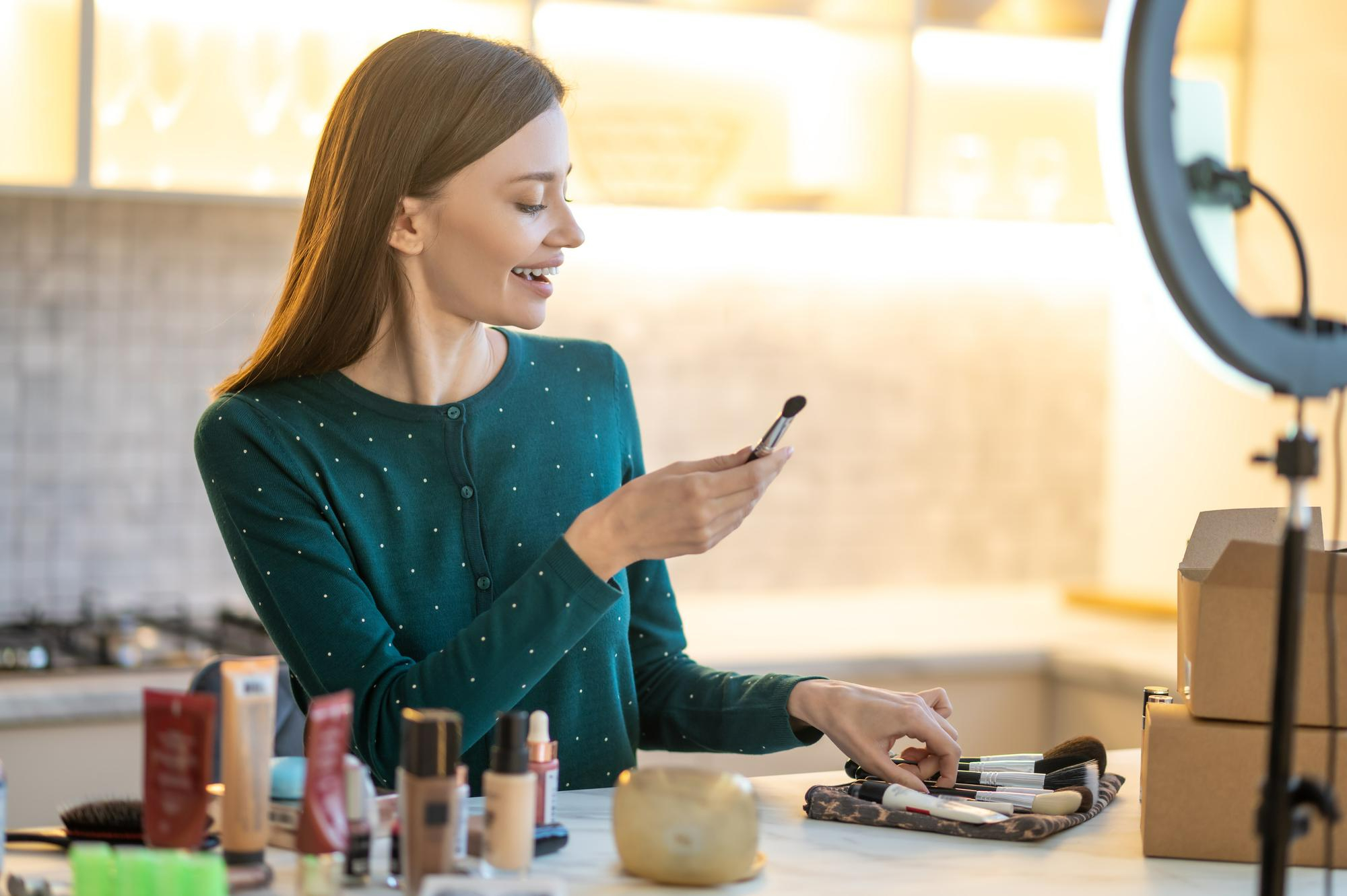 Make-up application with a face brush at Baddy's Parlour, Bolton
