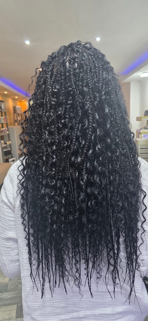 Protective styling at Baddy's Parlour Bolton, where we keep braids and locs healthy