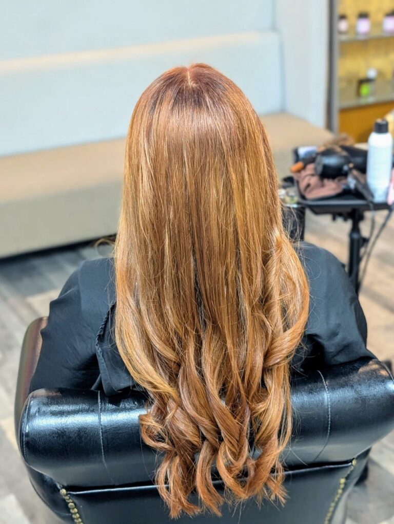 Caramel copper long wavy blow-dry at Baddys Parlour, Bolton