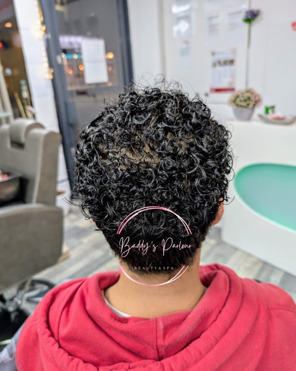 Curly perm by Baddys Parlour hair salon, Bolton