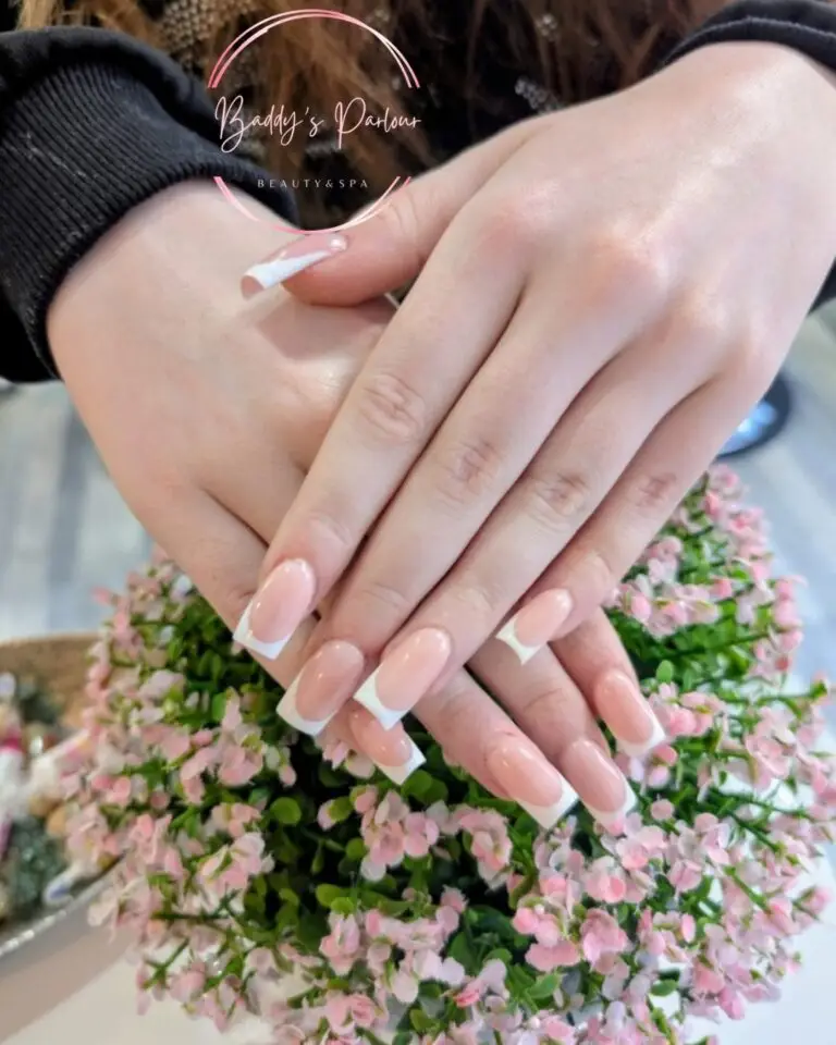 Long French-tip nails at Baddy's Parlour, Bolton